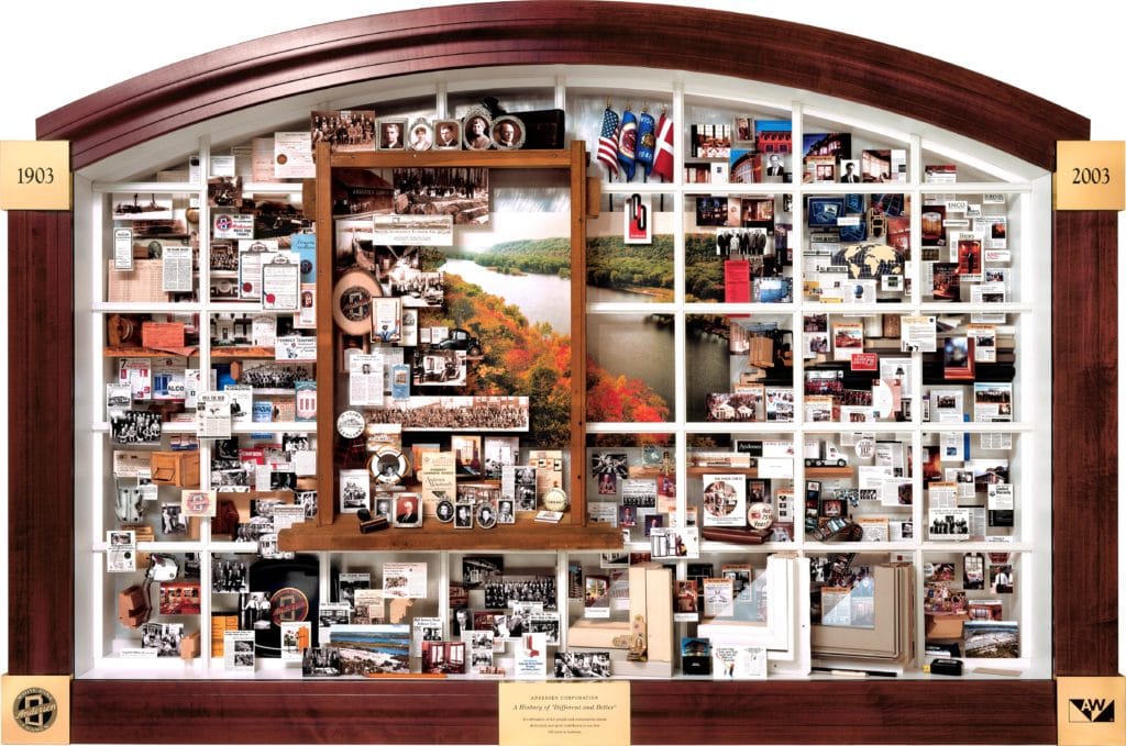 Andersen Windows 100th Anniversary Collage commemorating history, family leaders, products, growth accomplishments. Lobby art in Andersen Bayport, MN headquarters.