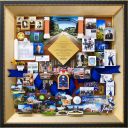 Large personalized collage with over 65 items for the president of Creighton University. Containing items that celebrate accomplishments, favorite memories, and growth under the president’s leadership.