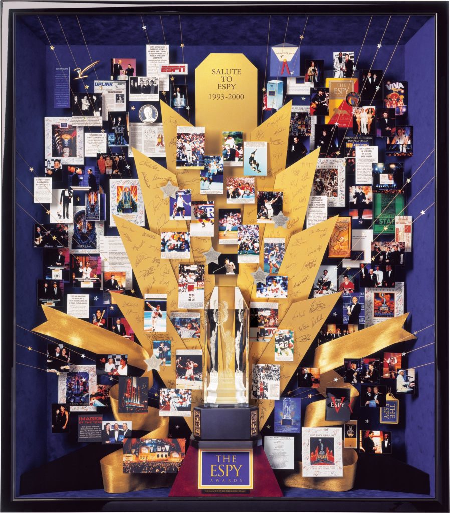 ESPY Awards collage commissioned by ESPN to celebrate 10th anniversary. Autographs of presenters are engraved in brass rays. Gold ribbons and stars add to the glamour of the Espy Awards.