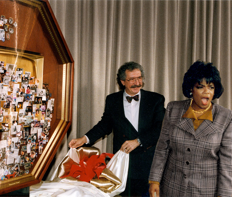 KingWorld Productions presented this artwork to Oprah Winfrey as a Christmas gift. The large collage celebrates her story from childhood to the success of The Oprah Winfrey Show. The unveiling of the gift was a fantastic surprise.