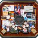 Large collage with over 50 items for the president and CEO of Exelis. Containing items and images that celebrate the company's history and honor the CEO's leadership and accomplishments.