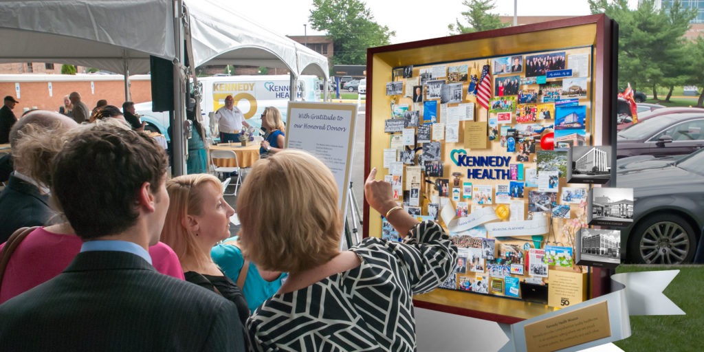 Large collage for hospital anniversary celebration featuring miniature photos and 3D items.