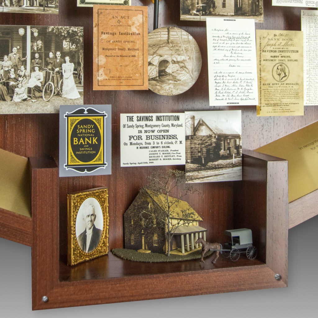 Close-up of 3D miniature objects in commemorative collage