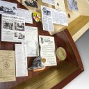 Close-up of 3D miniature objects in commemorative collage
