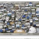 Construction Company Lochner 75th Anniversary lobby art. With actual hard hat, architectural instruments, miniature drawing board, slide rule