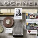 Close-up of 3D miniature objects in commemorative collage