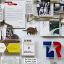 Close-up of 3D miniature objects in commemorative collage including armadillo