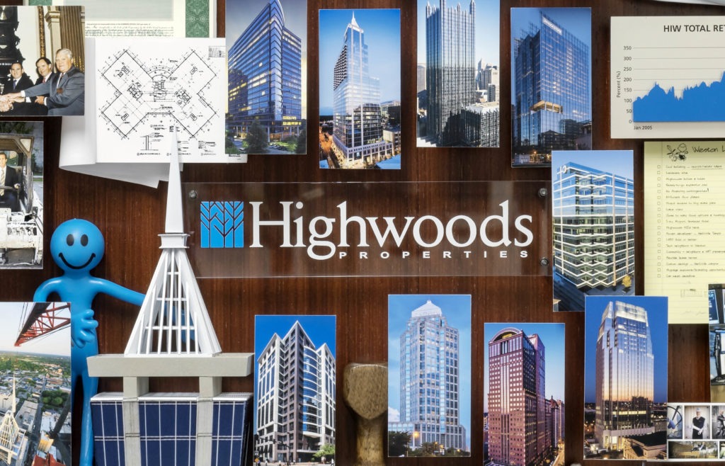 Close-up of Highwoods Properties logo in center of collage