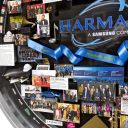 Close-up of 3D miniature objects in commemorative collage including blue ribbon