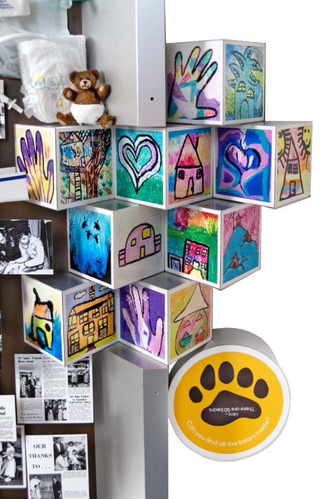 Close-up of 3D building blocks with children's art