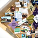 Close-up of 3D miniature objects in commemorative collage