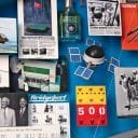Close-up of 3D miniature objects in commemorative collage
