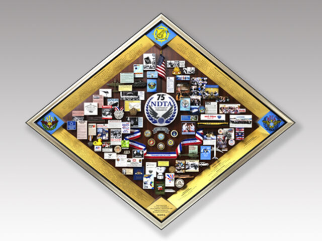 Large shadow box collage commemorating National Defense and Transportation Association's 75th Anniversary