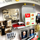 Close-up of 3D miniature vintage car and carhop serving tray in collage