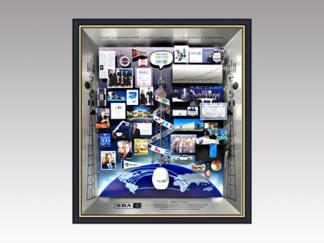Shadow box collage for SBA Communications CEO tribute with silver metal inner sides