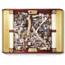 Large shadow box collage commemorating Hughston Clinic's 50th Anniversary including skeleton model bones