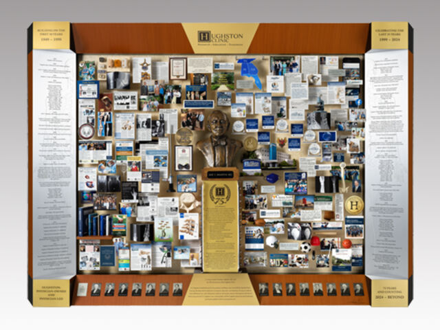 Large shadow box collage commemorating Hughston Clinic's 75th Anniversary with a bust of the founder in the center