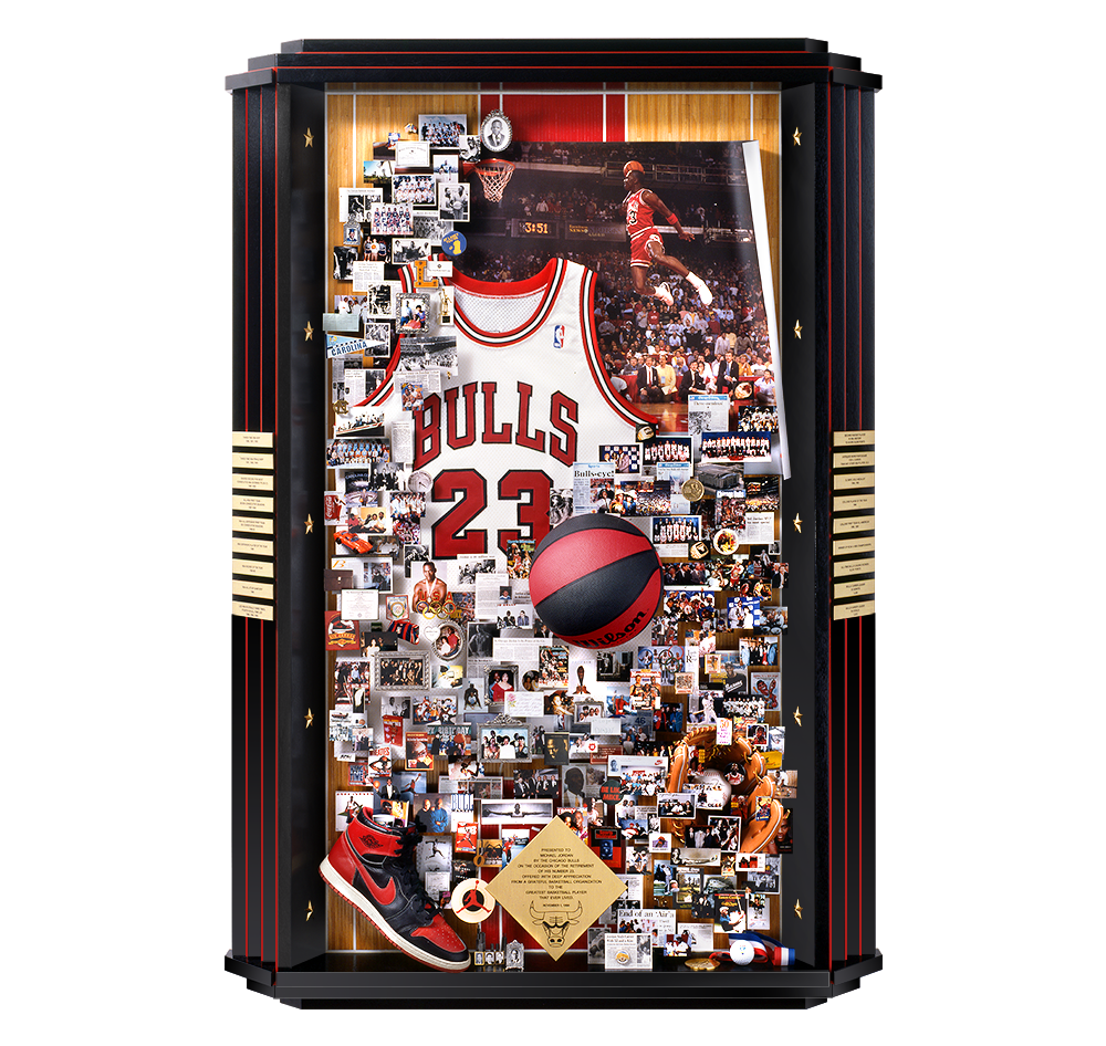 Tall shadow box collage presented to Michael Jordan which includes a jersey, shoe, and other memorabilia