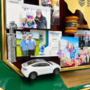 Close-up of 3D items including diecast car